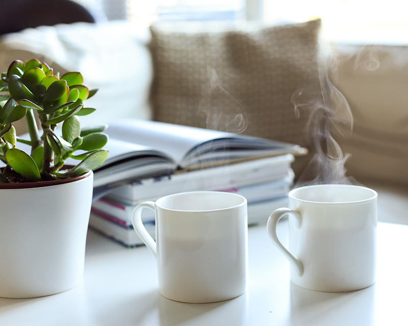 Two mugs of tea on a coffee table in therapist office in Glen Ridge, NJ